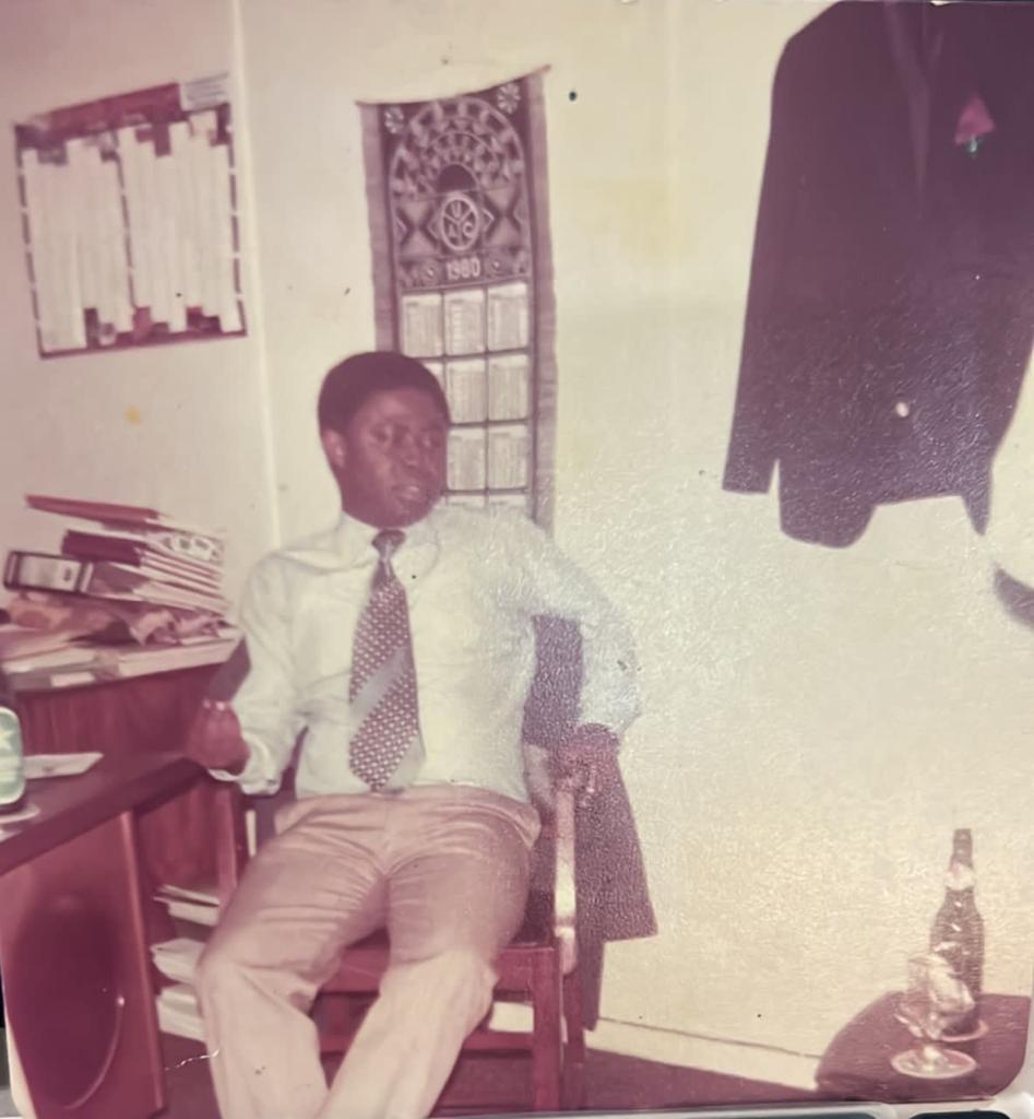Young Atta Panin at his desk