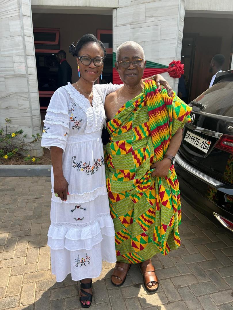 With family member in Kente